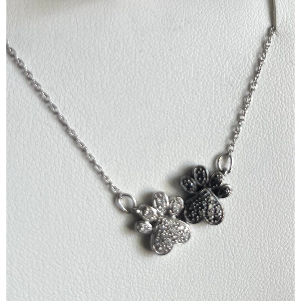 NEW .2 CT. T.W. Enhanced Black and White Diamond Double Paw Print Necklace